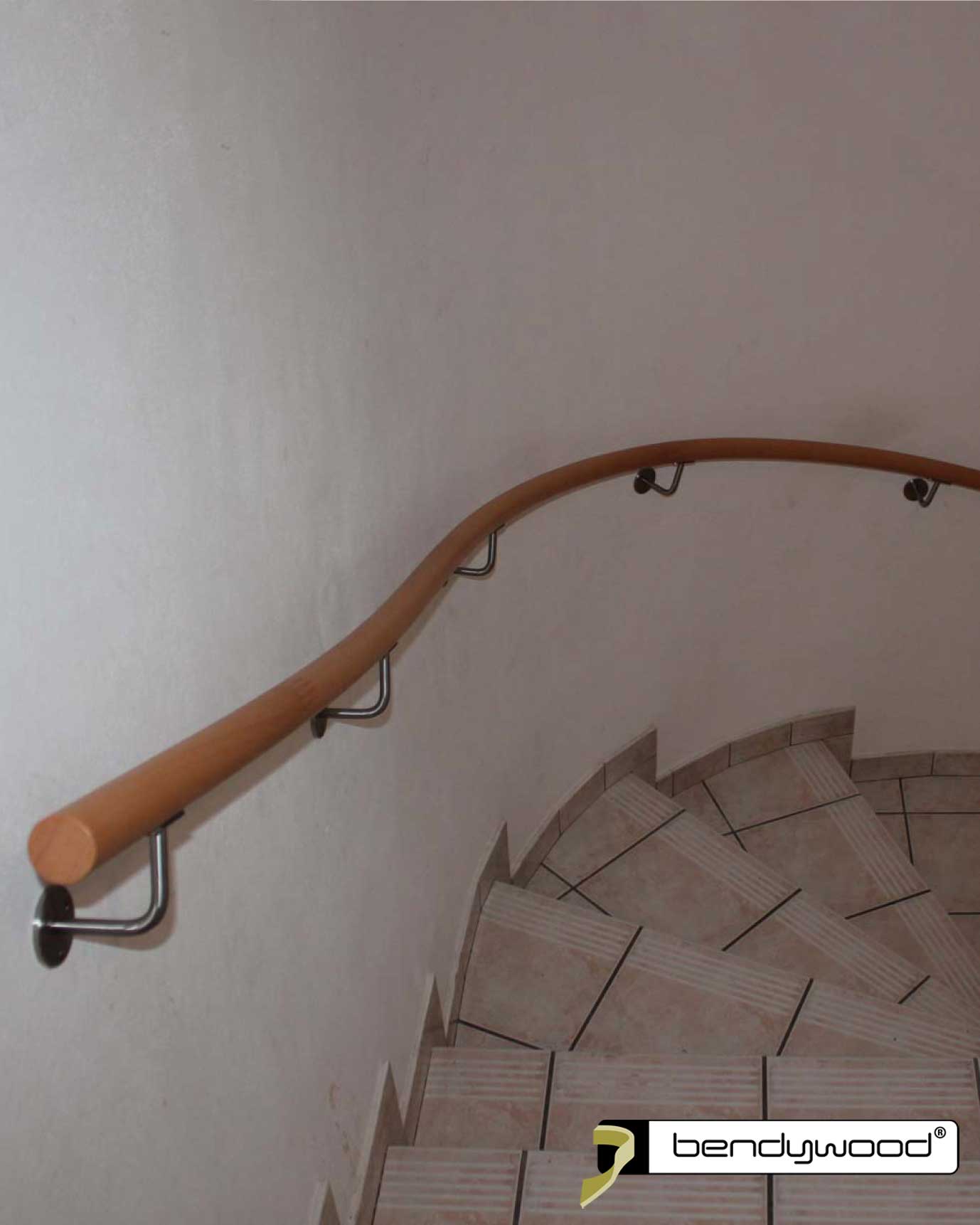 Round bending handrails in Bendywood®-beech for staircase with irregular bending radius